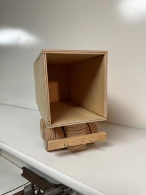 HANDCRAFTED WOODEN TOYS 1 LARGE, 1 SMALL SIZE WITH EMBEDDED PENNY FOR YEAR MADE