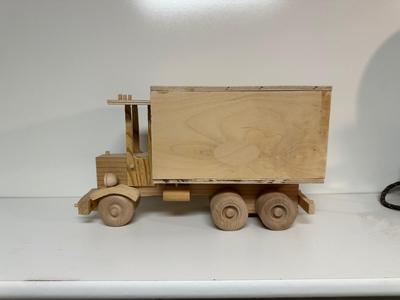 HANDCRAFTED WOODEN TOYS 1 LARGE, 1 SMALL SIZE WITH EMBEDDED PENNY FOR YEAR MADE