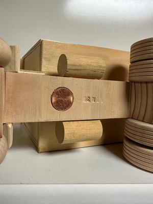 HANDCRAFTED WOODEN TOYS 1 LARGE, 1 SMALL SIZE WITH EMBEDDED PENNY FOR YEAR MADE