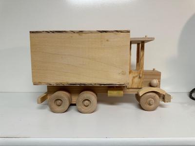 HANDCRAFTED WOODEN TOYS 1 LARGE, 1 SMALL SIZE WITH EMBEDDED PENNY FOR YEAR MADE