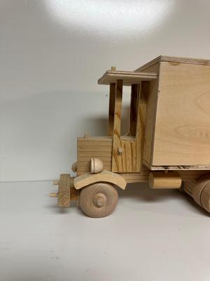 HANDCRAFTED WOODEN TOYS 1 LARGE, 1 SMALL SIZE WITH EMBEDDED PENNY FOR YEAR MADE