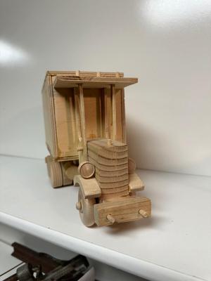 HANDCRAFTED WOODEN TOYS 1 LARGE, 1 SMALL SIZE WITH EMBEDDED PENNY FOR YEAR MADE