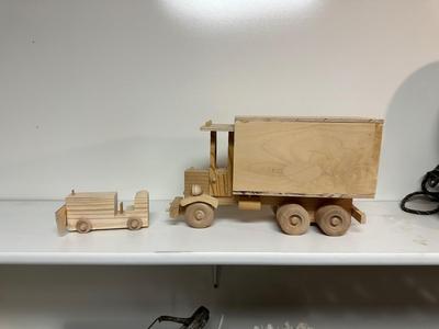HANDCRAFTED WOODEN TOYS 1 LARGE, 1 SMALL SIZE WITH EMBEDDED PENNY FOR YEAR MADE