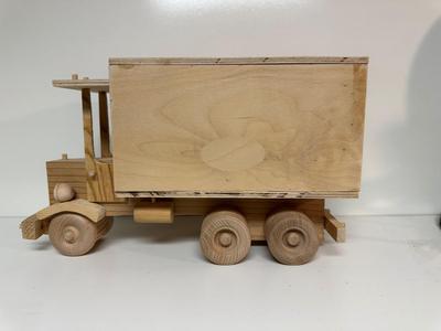 HANDCRAFTED WOODEN TOYS 1 LARGE, 1 SMALL SIZE WITH EMBEDDED PENNY FOR YEAR MADE