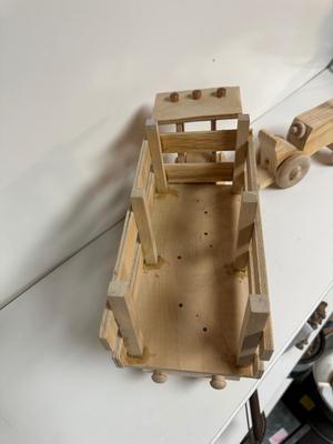 HANDCRAFTED 1 LARGE, 1 MED SIZE WOODEN TOYS WITH EMBEDDED PENNY FOR YEAR MADE