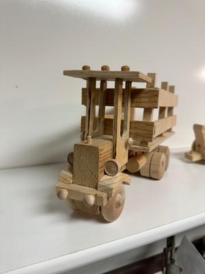 HANDCRAFTED 1 LARGE, 1 MED SIZE WOODEN TOYS WITH EMBEDDED PENNY FOR YEAR MADE