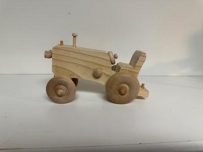 HANDCRAFTED 1 LARGE, 1 MED SIZE WOODEN TOYS WITH EMBEDDED PENNY FOR YEAR MADE