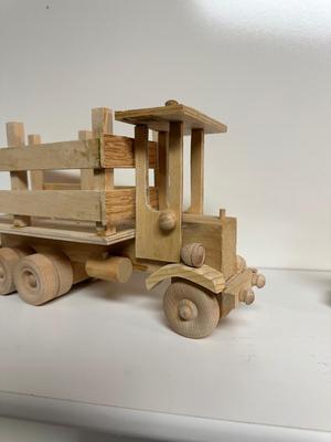 HANDCRAFTED 1 LARGE, 1 MED SIZE WOODEN TOYS WITH EMBEDDED PENNY FOR YEAR MADE