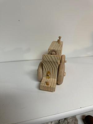 HANDCRAFTED 1 LARGE, 1 MED SIZE WOODEN TOYS WITH EMBEDDED PENNY FOR YEAR MADE