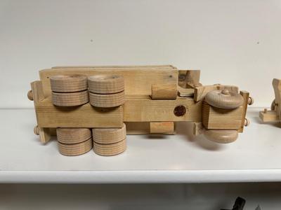 HANDCRAFTED 1 LARGE, 1 MED SIZE WOODEN TOYS WITH EMBEDDED PENNY FOR YEAR MADE