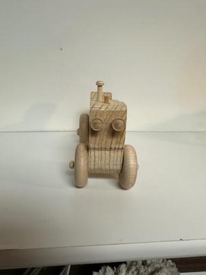 HANDCRAFTED 1 LARGE, 1 MED SIZE WOODEN TOYS WITH EMBEDDED PENNY FOR YEAR MADE