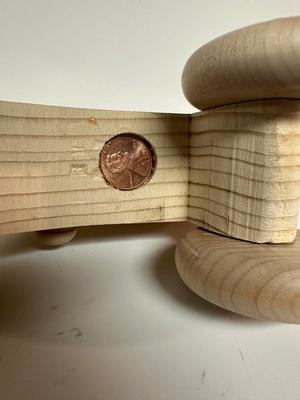 HANDCRAFTED 1 LARGE, 1 MED SIZE WOODEN TOYS WITH EMBEDDED PENNY FOR YEAR MADE