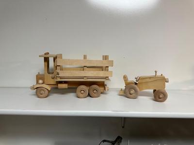 HANDCRAFTED 1 LARGE, 1 MED SIZE WOODEN TOYS WITH EMBEDDED PENNY FOR YEAR MADE