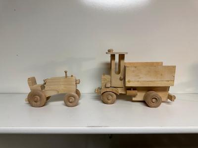 HANDCRAFTED WOODEN TOYS 1 LARGE, 1 MED SIZE WITH EMBEDDED PENNY FOR YEAR MADE