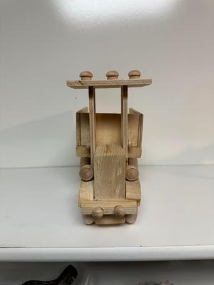 HANDCRAFTED WOODEN TOYS 1 LARGE, 1 MED SIZE WITH EMBEDDED PENNY FOR YEAR MADE