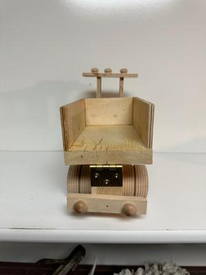 HANDCRAFTED WOODEN TOYS 1 LARGE, 1 MED SIZE WITH EMBEDDED PENNY FOR YEAR MADE