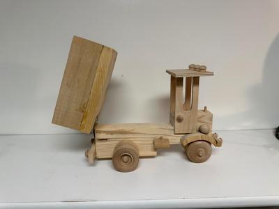 HANDCRAFTED WOODEN TOYS 1 LARGE, 1 MED SIZE WITH EMBEDDED PENNY FOR YEAR MADE