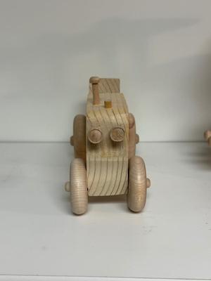 HANDCRAFTED WOODEN TOYS 1 LARGE, 1 MED SIZE WITH EMBEDDED PENNY FOR YEAR MADE
