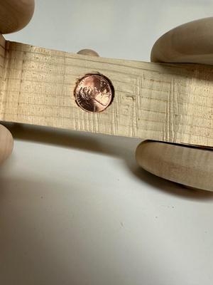 HANDCRAFTED WOODEN TOYS 1 LARGE, 1 MED SIZE WITH EMBEDDED PENNY FOR YEAR MADE