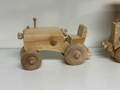 HANDCRAFTED WOODEN TOYS 1 LARGE, 1 MED SIZE WITH EMBEDDED PENNY FOR YEAR MADE