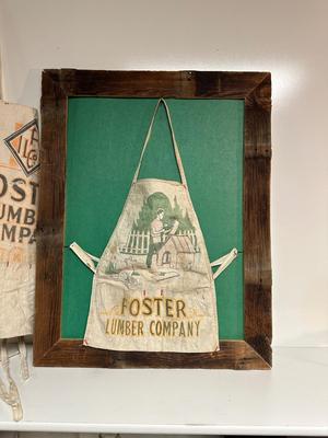 3 FOSTER LUMBER CO APRONS AND 1 YARD STICK