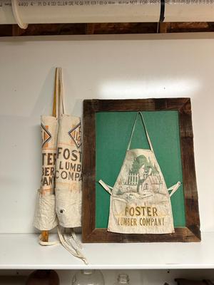 3 FOSTER LUMBER CO APRONS AND 1 YARD STICK