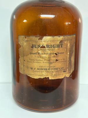 BROWN GLASS JUG AND BOTTLES