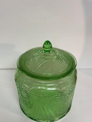 IRIDESCENT SUNSET CARNIVAL GLASS VASE, GREEN DEPRESSION GLASS COOKIE JAR AND BROWN GLASS BOTTLE