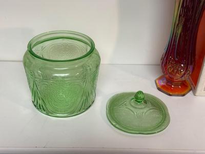 IRIDESCENT SUNSET CARNIVAL GLASS VASE, GREEN DEPRESSION GLASS COOKIE JAR AND BROWN GLASS BOTTLE