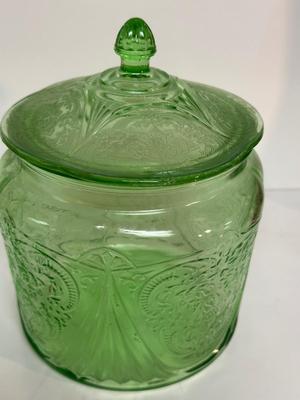 IRIDESCENT SUNSET CARNIVAL GLASS VASE, GREEN DEPRESSION GLASS COOKIE JAR AND BROWN GLASS BOTTLE