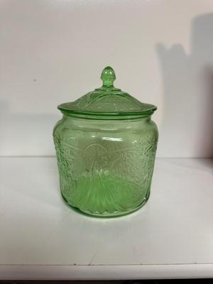 IRIDESCENT SUNSET CARNIVAL GLASS VASE, GREEN DEPRESSION GLASS COOKIE JAR AND BROWN GLASS BOTTLE