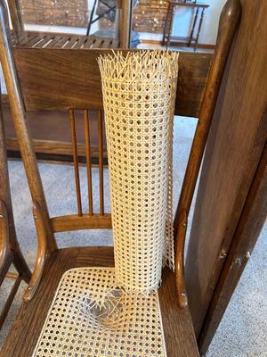 GORGEOUS ANTIQUE TABLE WITH 4 LEAVES AND 8 CANE SEAT CHAIRS