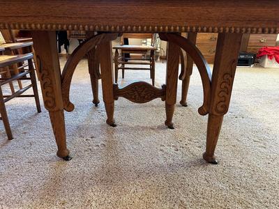 GORGEOUS ANTIQUE TABLE WITH 4 LEAVES AND 8 CANE SEAT CHAIRS