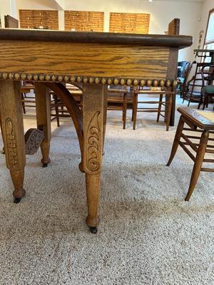 GORGEOUS ANTIQUE TABLE WITH 4 LEAVES AND 8 CANE SEAT CHAIRS