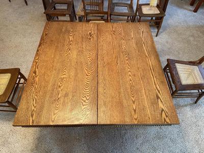 GORGEOUS ANTIQUE TABLE WITH 4 LEAVES AND 8 CANE SEAT CHAIRS