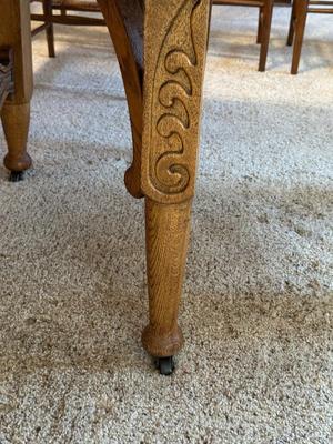 GORGEOUS ANTIQUE TABLE WITH 4 LEAVES AND 8 CANE SEAT CHAIRS