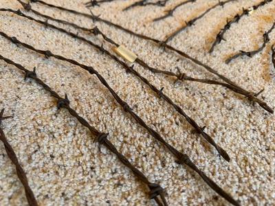 AN ASSORTMENT OF BARBED WIRE