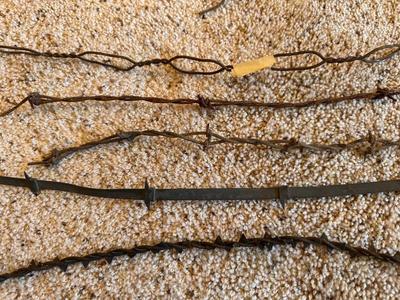 AN ASSORTMENT OF BARBED WIRE