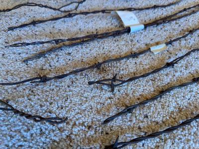 AN ASSORTMENT OF BARBED WIRE