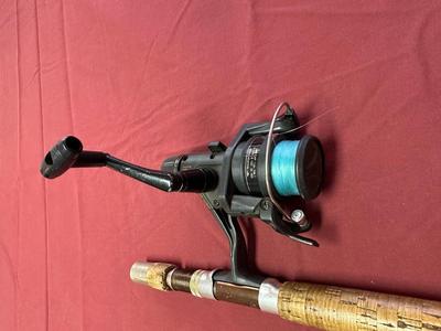 EAGLE CLAW AND WRIGHT AND MCGILL FISHING RODS AND A SHIMANO REEL