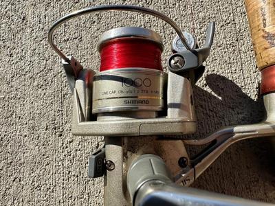 FENWICK EAGLE GRAPHITE FISHING POLE AND SHIMANO 1000 REEL WITH FISHING ROD