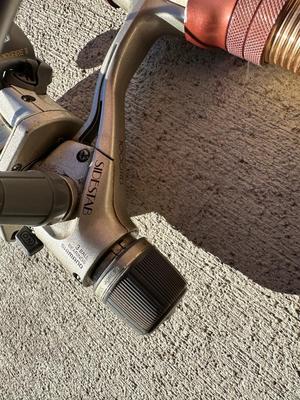 FENWICK EAGLE GRAPHITE FISHING POLE AND SHIMANO 1000 REEL WITH FISHING ROD