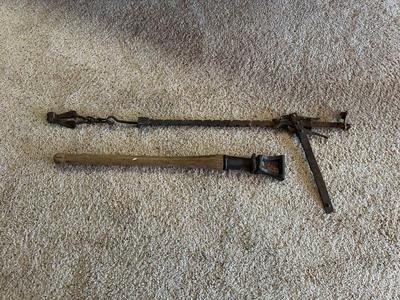 ANTIQUE BUTTERIS AND A BARBED WIRE FENCE STRETCHER?