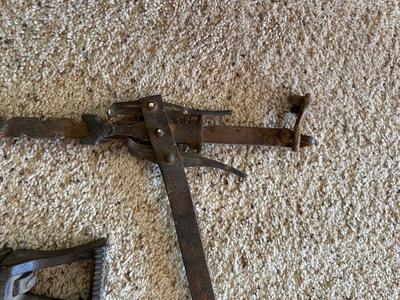 ANTIQUE BUTTERIS AND A BARBED WIRE FENCE STRETCHER?