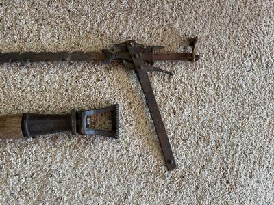 ANTIQUE BUTTERIS AND A BARBED WIRE FENCE STRETCHER?
