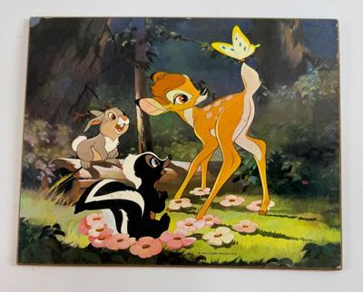 Sale Photo Thumbnail #169: This is the famous 1942 Bambi scene where he meets Flower, Thumper and a butterfly. A must for any Disneyana collector.