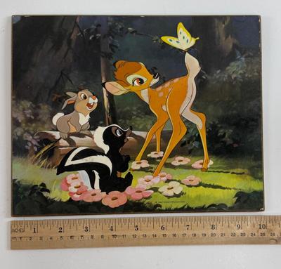 Sale Photo Thumbnail #170: This is the famous 1942 Bambi scene where he meets Flower, Thumper and a butterfly. A must for any Disneyana collector.