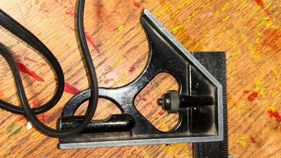 CHICAGO ELECTRIC DETAIL SANDER, MITER SAW FROM SCAGS, AND AN ADJUSTABLE CARPENTER SQUARE