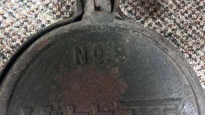 HIBBARD CAST IRON WAFFLE MAKER AND A FUEL JUG TO KEEP THE WAFFLES COOKING