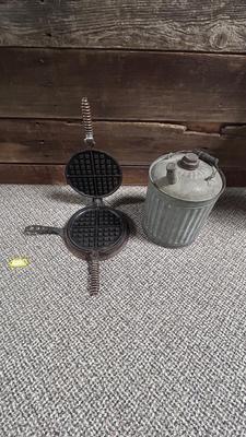 HIBBARD CAST IRON WAFFLE MAKER AND A FUEL JUG TO KEEP THE WAFFLES COOKING